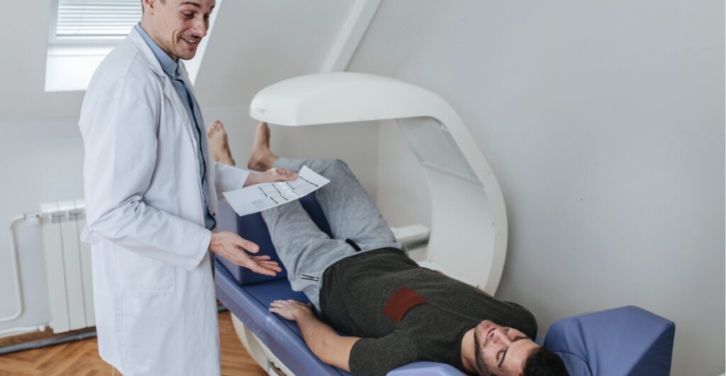 Patient getting body scan on a DEXA scan